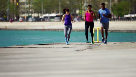 Multi-Ethnic-male-and-females-distance-training-outdoors