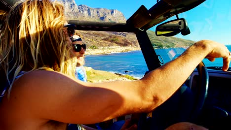 Group-of-female-friends-interacting-each-other-in-the-car-4k