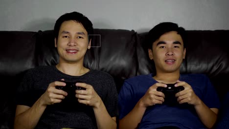 two-man-playing-video-games-and-wins