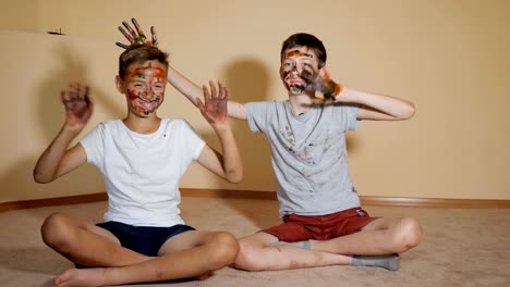 Playful-boys-with-colored-faces