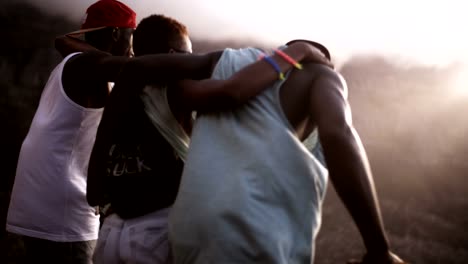 Group-of-afro-teen-friends-dancing-with-longboards