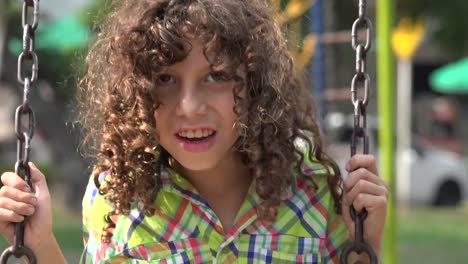 Mentally-Disabled-Boy-on-Swing-Set