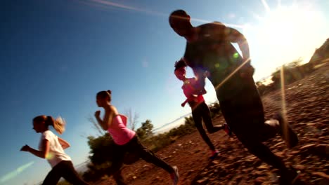 Team-of-runners-training-outdoors-on-summer