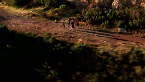 Group-of-mutli-ethnical-athletes-running-outdoors