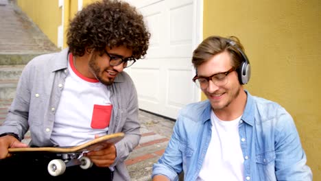 Young-man-interacting-with-his-friend