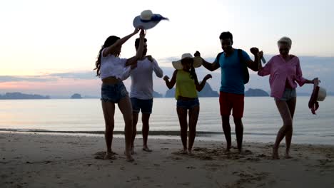 People-Dancing-On-Beach-At-Sunset,-Happy-Friends-Mix-Race-Group-Tourists-Sea-Vacation