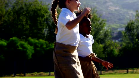 Children-playing-a-sack-race-in-park