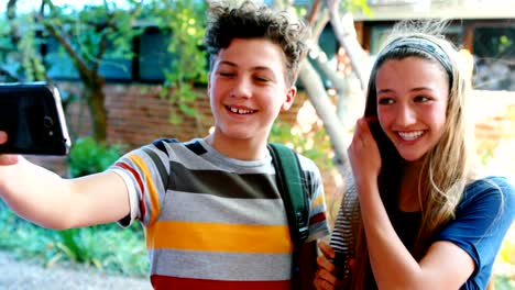 School-kids-taking-selfie-from-mobile-phone