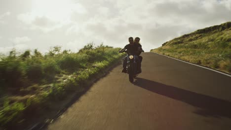 Couple-Riding-Vintage-Motorcycle