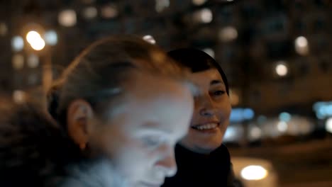 Woman-sharing-news-with-her-friend-during-evening-walk