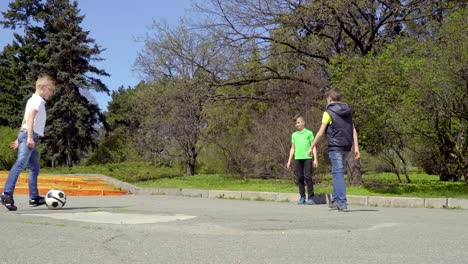 Children-plays-football-in-park