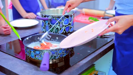 Close-up-of-cooking-fish-with-sour-cream-sauce