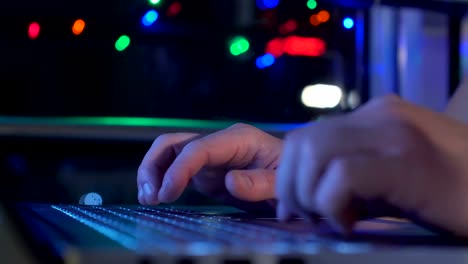 Hands-of-a-man-working-by-computer-late-night