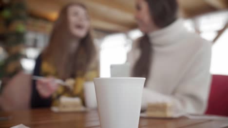 Disposable-cup-at-table