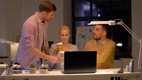 business-team-with-laptop-and-coffee-at-office