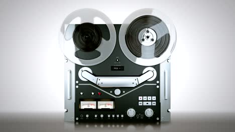 Reel-tape-recorder-while-playing-a-reel-tape-on-it