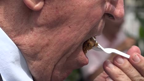 Man-Eating-Cake-and-Drinking-Coffee