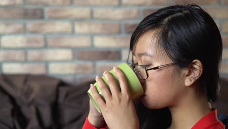 Portrait-young-woman-enjoy-drink