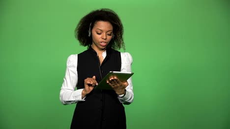 Female-support-call-center-with-tablet-and-headset