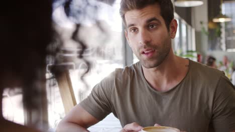 Couple-Meeting-For-Date-In-Coffee-Shop-Shot-In-Slow-Motion