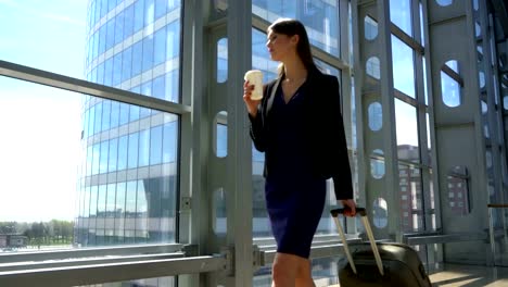 Woman-walking-with-suitcase