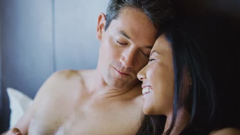 Couple-Enjoying-Breakfast-in-Bed