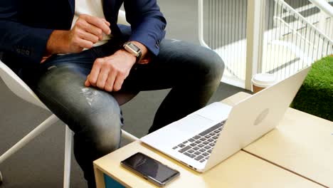 Businessman-using-smartwatch-in-office-4k