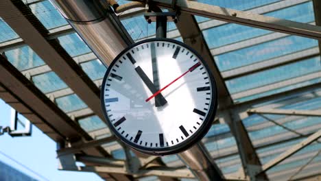 Public-clock-on-the-train-station-in-4k-slow-motion-60fps