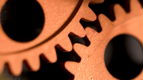 clock's-mechanism:wheels-running,-beating-time--close-up