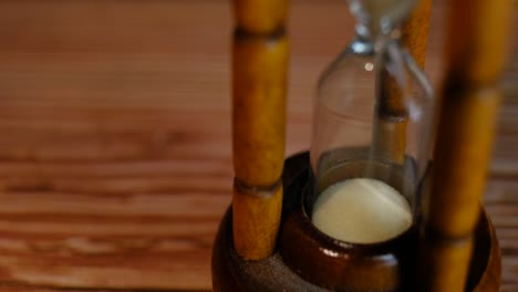 Close-up-View-of-Sand-in-hourglass-or-sandglass-for-time-counting-down.-for-loop-or-repeat-pattern.