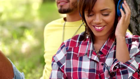 Mixed-Race-Woman-Listening-to-Headphones