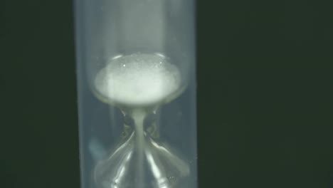 The-last-drops-of-sand-are-dropping-in-the-hourglass