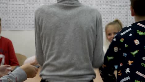 Group-of-elementary-school-children-in-classroom-at-lesson