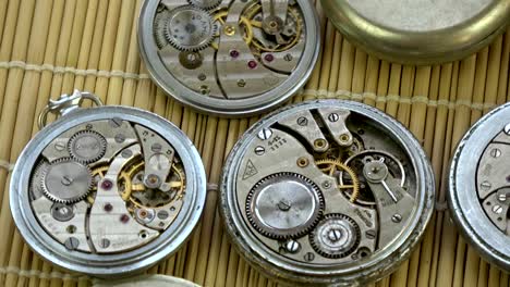 Old-pocket-clock-watch-group-rotating