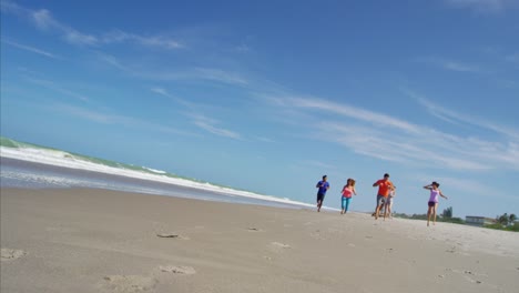 Young-multi-ethnic-friends-keeping-fit-on-beach