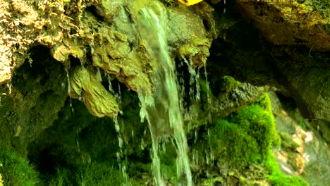 SLOW-motion,-waterfall,-stream-in-mountains-in-high-speed-frame-rate