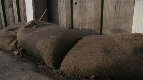 Close-Up-Flood-Protection-Sandbags-dolly-shot-4K-UHD.