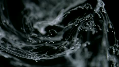 abstract-black-ink-in-water-on-white-background.