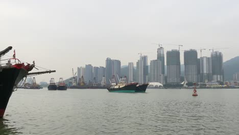china-day-time-macau-city-construction-bay-side-ship-dock-traffic-panorama-4k