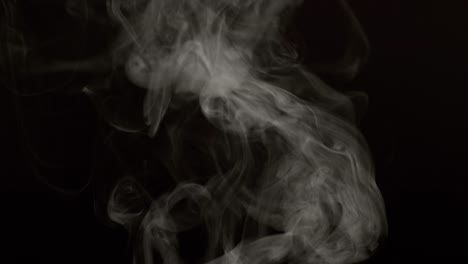 Steam-on-black-background-in-slow-motion