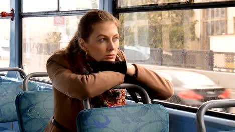 A-beautiful-girl-with-sad-eyes-is-alone-in-the-tram.