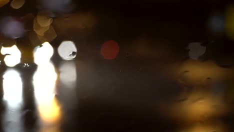 the-flow-of-water-on-the-windscreen-during-heavy-rain