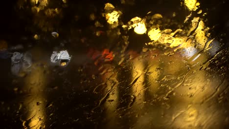 the-flow-of-water-on-the-windscreen-during-heavy-rain