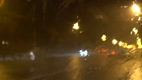 the-flow-of-water-on-the-windscreen-during-heavy-rain