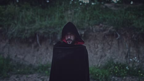 4K-Halloween-Horror-Man-with-Black-Cape-Looking-Evil