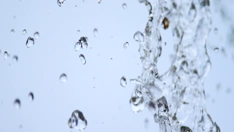 Slow-motion:-water-drop-fall-from-eaves-in-close-up