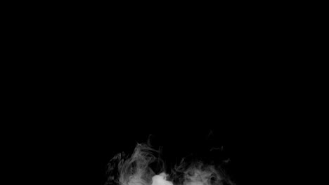 Smoke-billowing-over-un-fondo-negro.