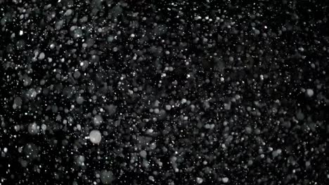 Slow-Motion-Snow-on-Black-Background