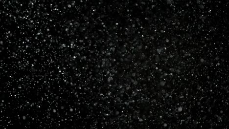 Slow-Motion-Snow-on-Black-Background