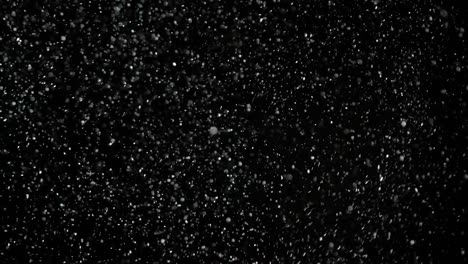 Slow-Motion-Snow-on-Black-Background